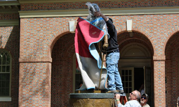 Unpacking the James Monroe statue.